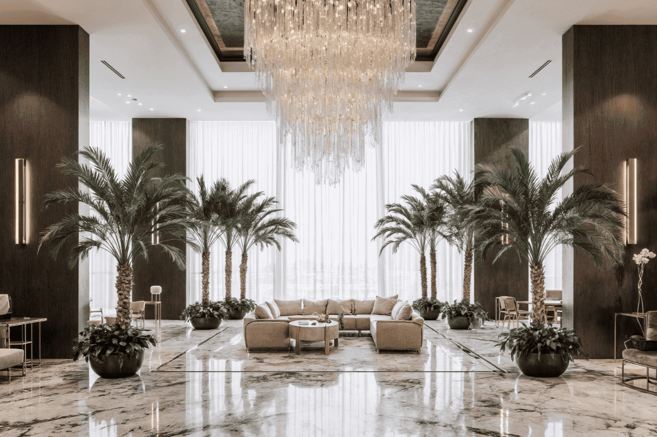 Luxurious Lobby with Palm Trees and Chandelier